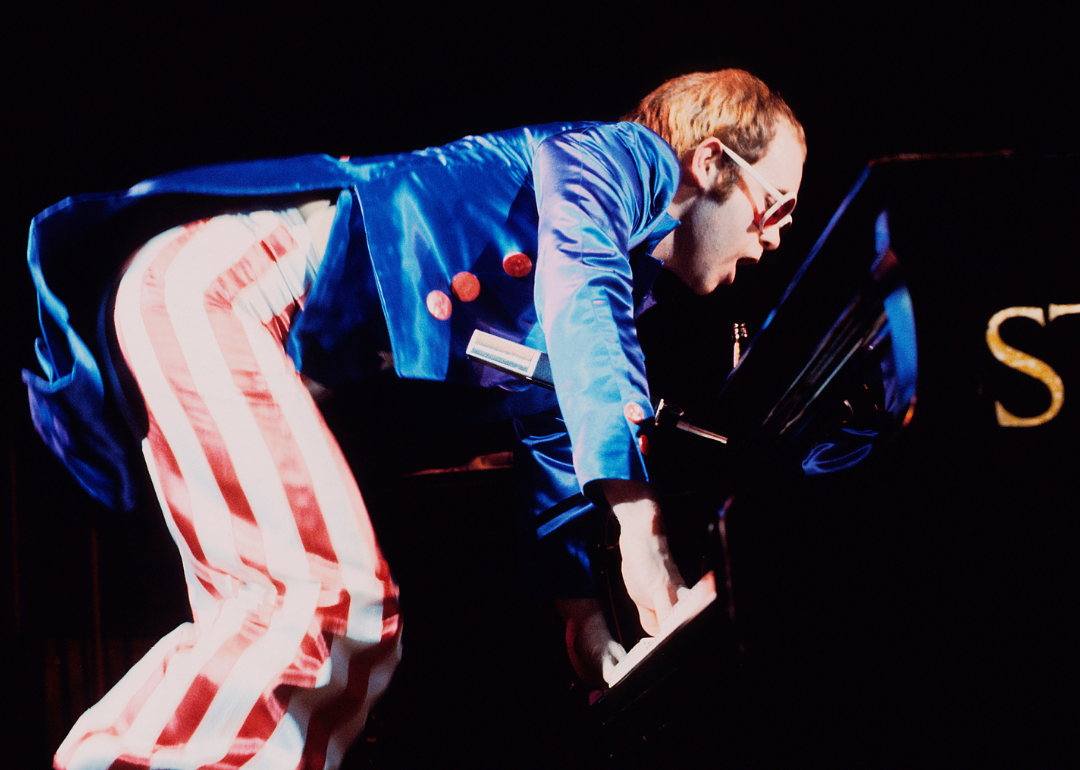 Elton John performing in concert circa 1976 in London, England.