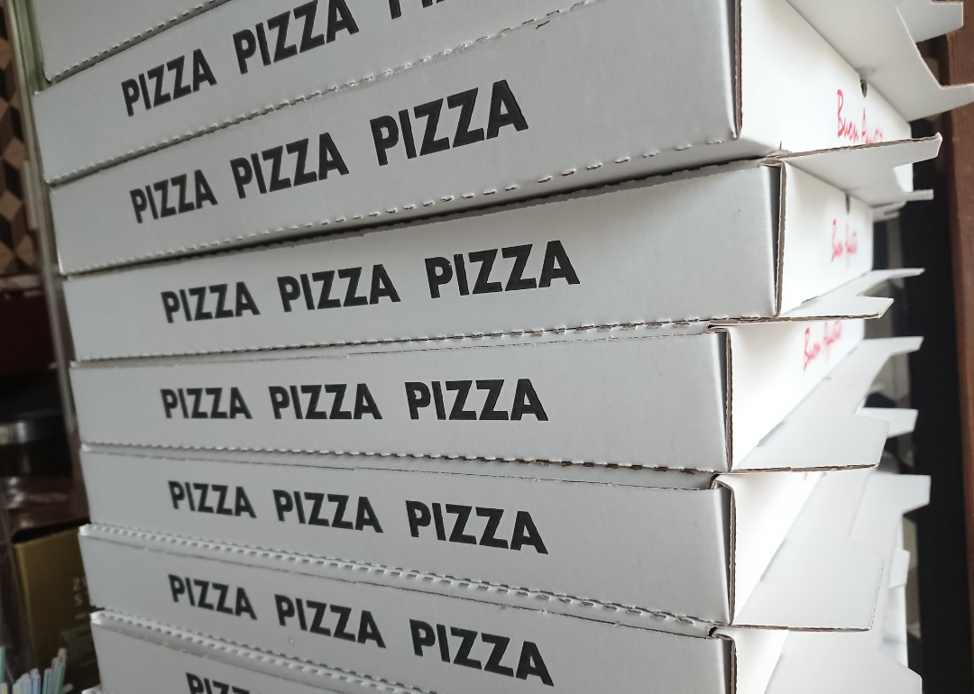 A stack of pizza boxes