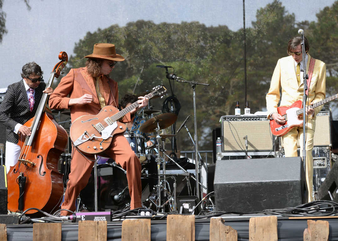 Bass player Sean Dean, guitarist Travis Good, and singer Dallas Good of The Sadies performing onstage at Golden Gate Park on October 3, 2015, in San Francisco, California.