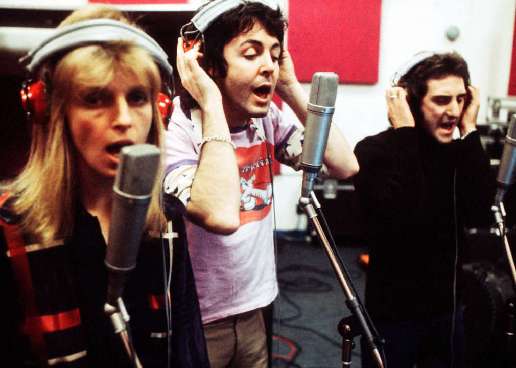Paul and Linda McCartney sing in a recording studio in the 1970s.