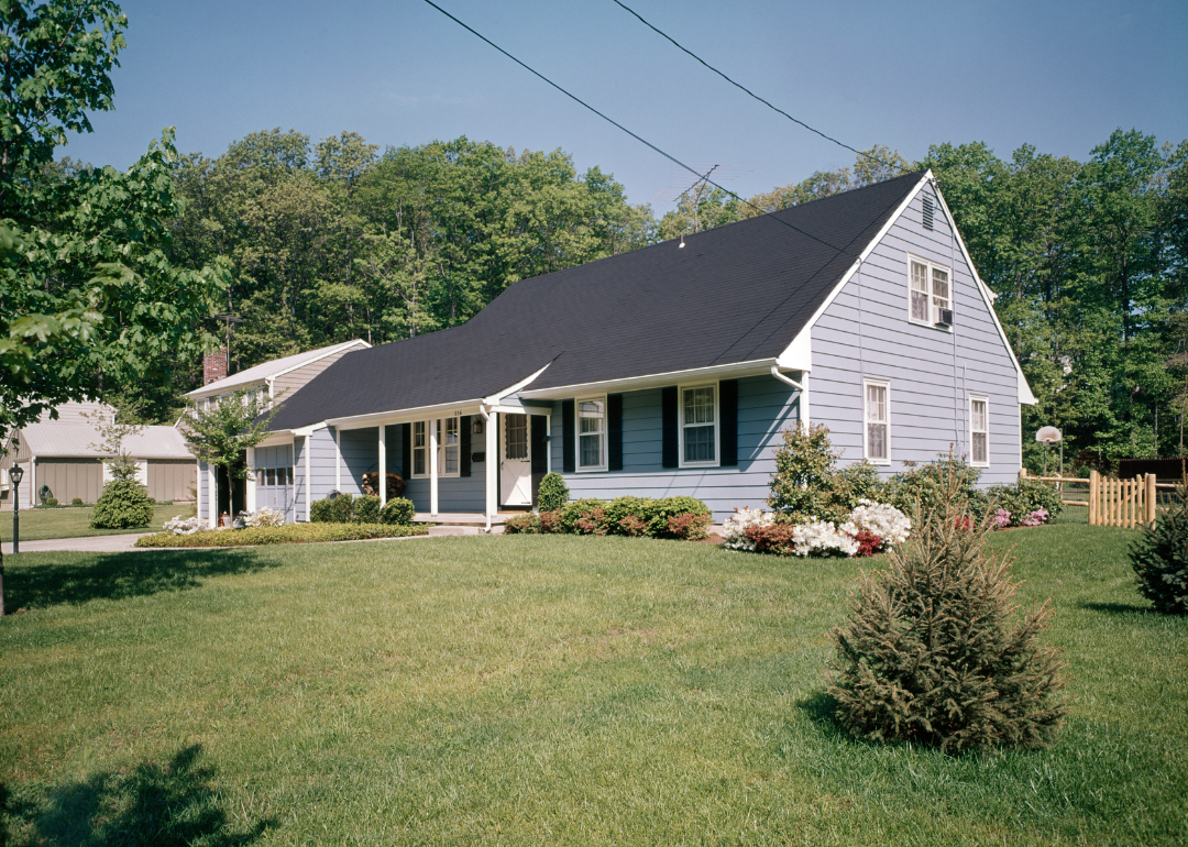 A blue home with black shutters in 1971.