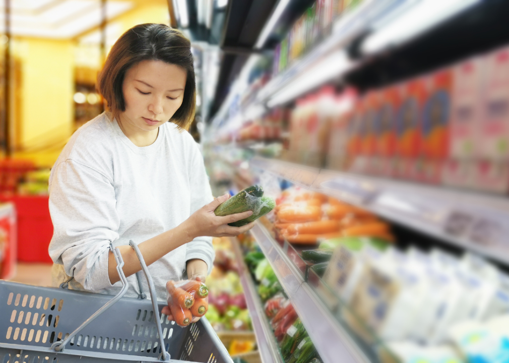 A woman buying produce