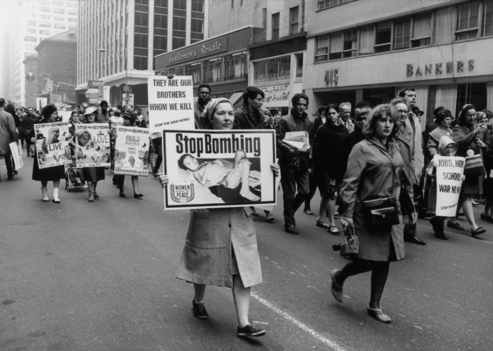 Marchers at an anti-Vietnam demonstration in New York carrying placards demanding the end of the bombing.