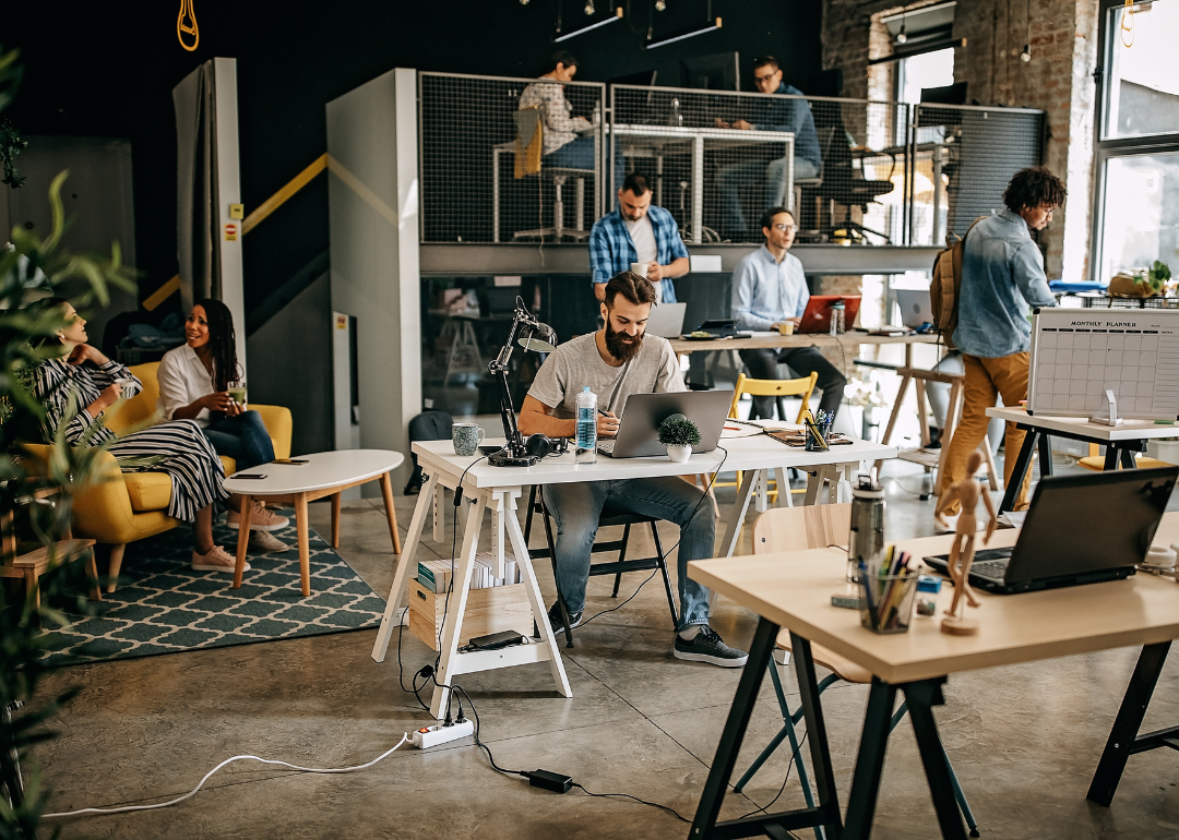 People working out of a comfortable coworking space.