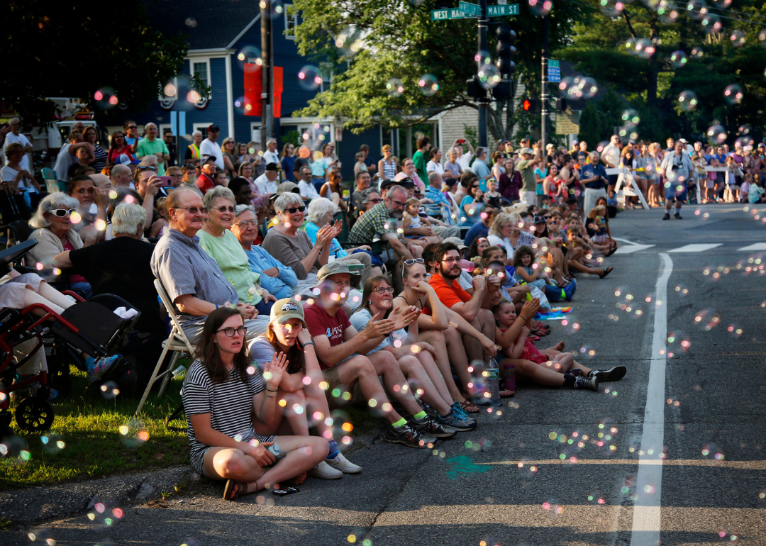 Bubbles filling the air as people watch the Yarmouth Clam Festival parade in Yarmouth, Maine.