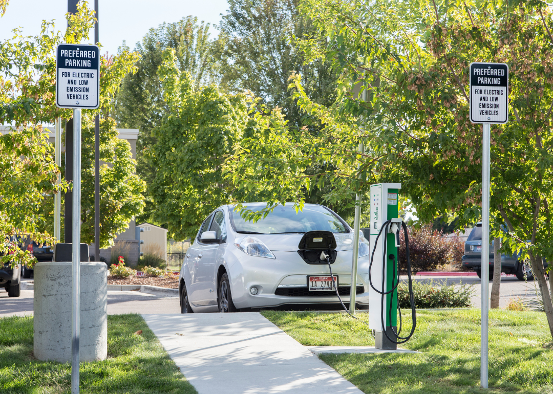 An electric car charging at a preferred parking charging station outside the Bown Crossing Library in Boise, Idaho.