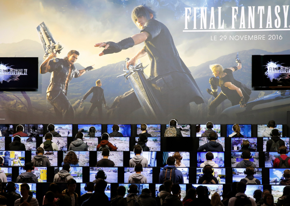 Gamers playing the video game "Final Fantasy XV"