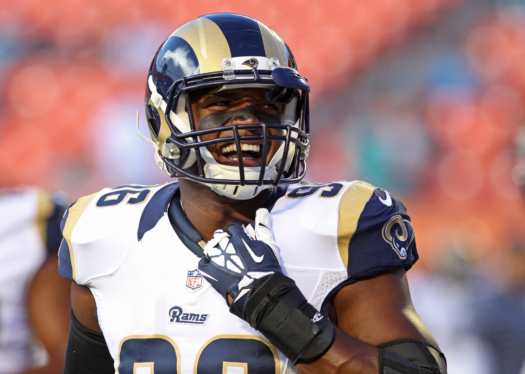 Defensive end Michael Sam, #96 of the St. Louis Rams, reacting during pregame workouts before his team met the Miami Dolphins at Sun Life Stadium on August 28, 2014.