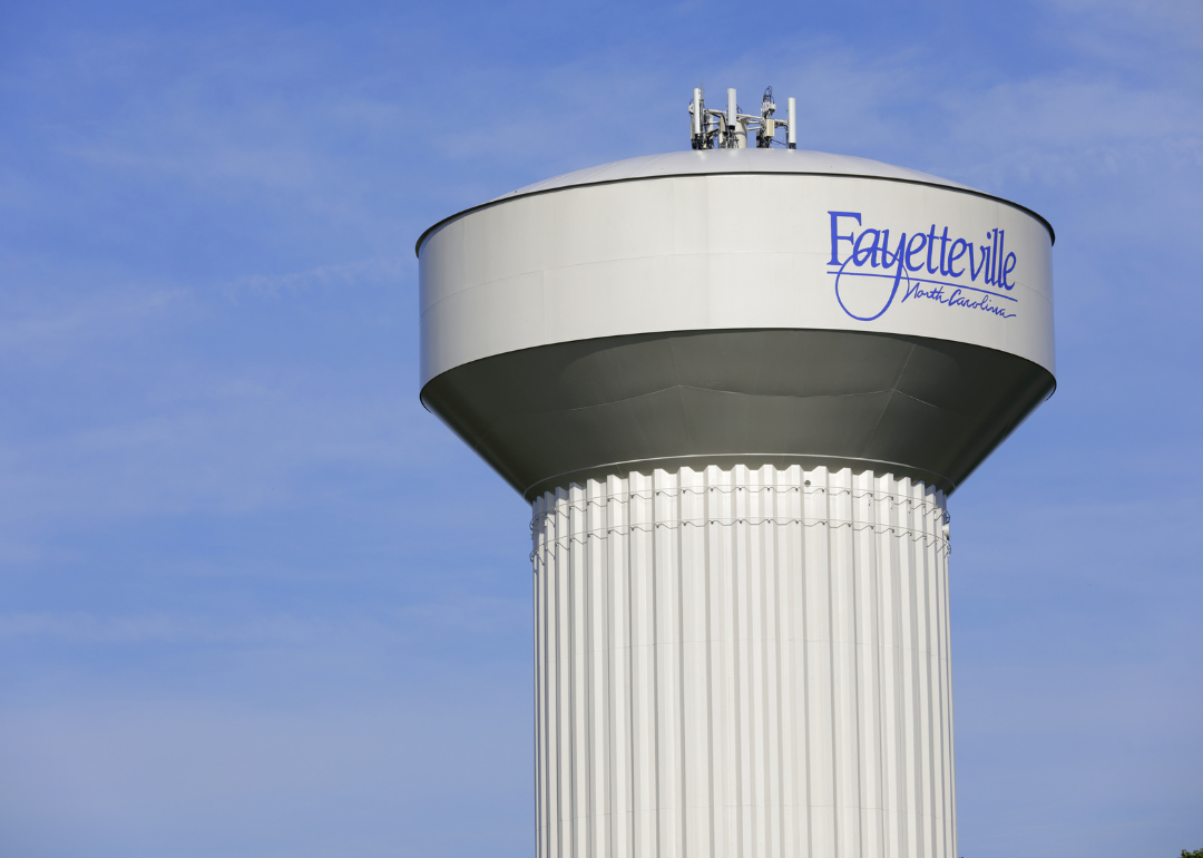The Fayetteville water tower in front of a light blue sky.