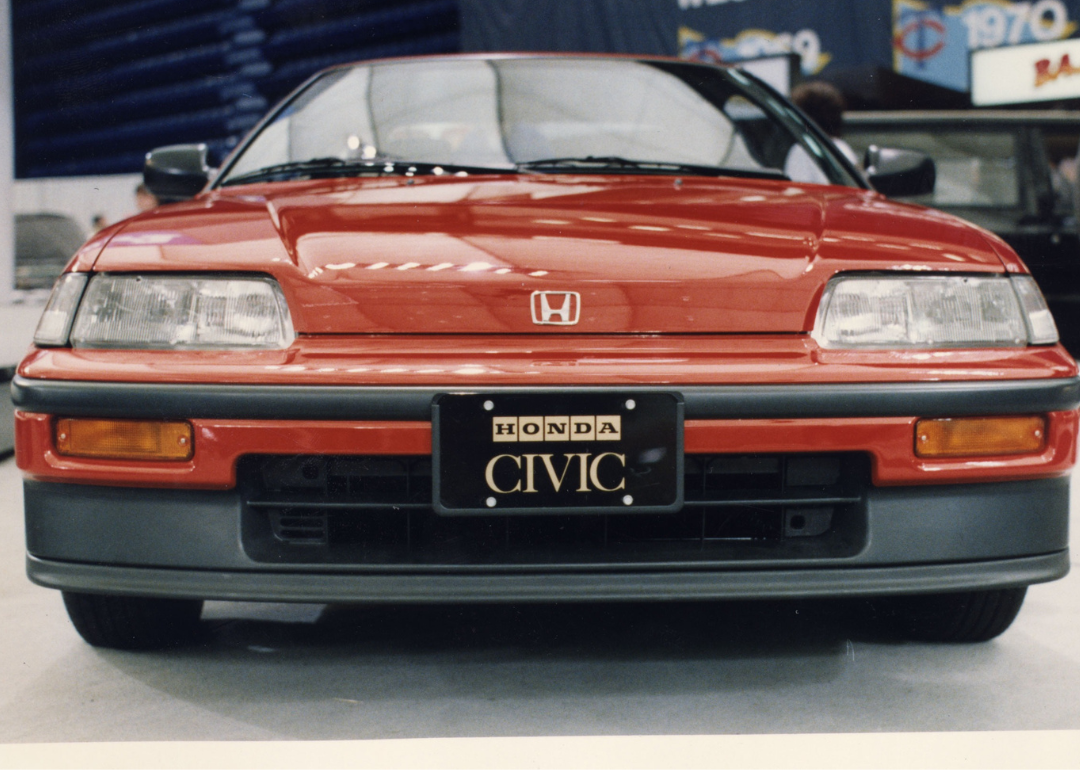 A 1989 Honda Civic CRX in a car showroom.