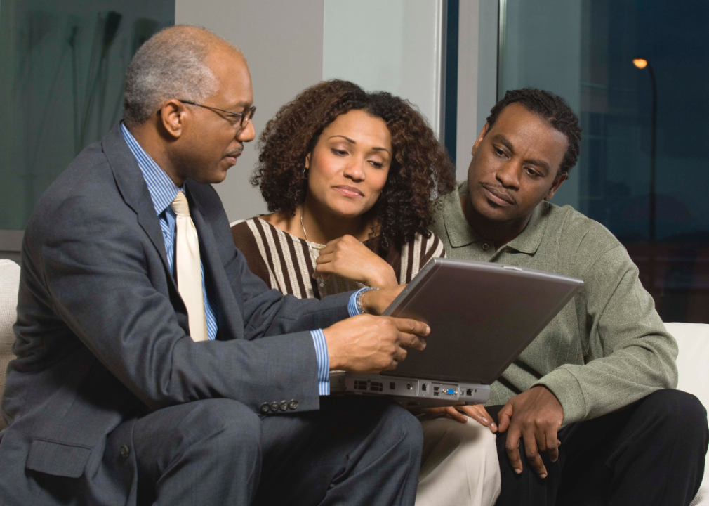 A couple meeting with a financial advisor