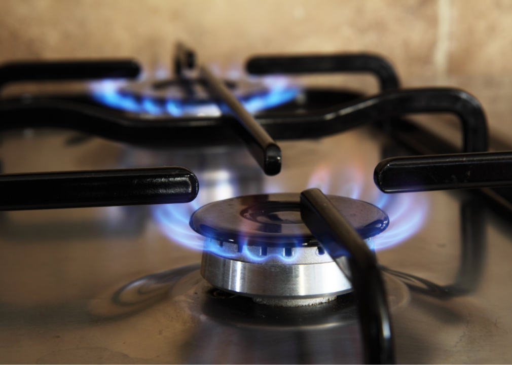Blue flames emanating from a gas stove