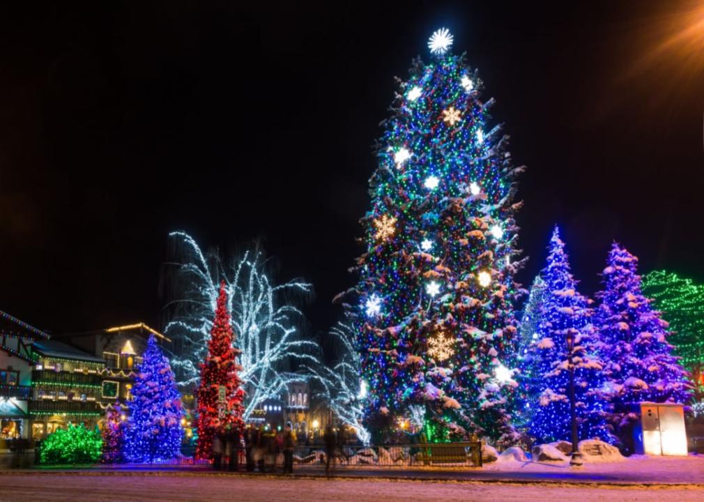 People gather around the large Christmas tree in downtown Leavenworth.
