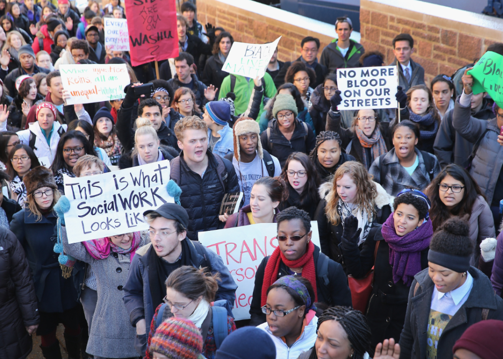 Students at Washington University protest with signs and posters