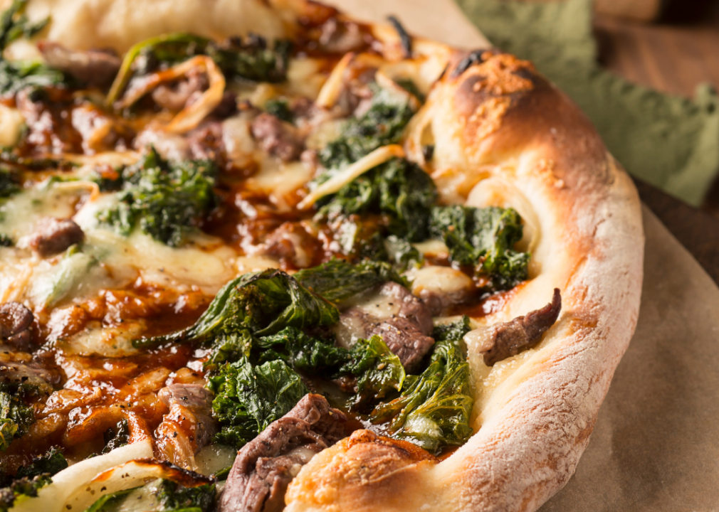 Artisan pizza with spinach.