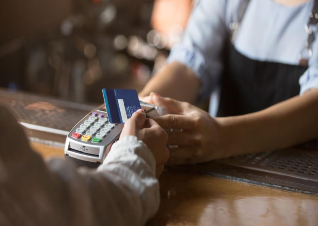 A person paying with a credit card.