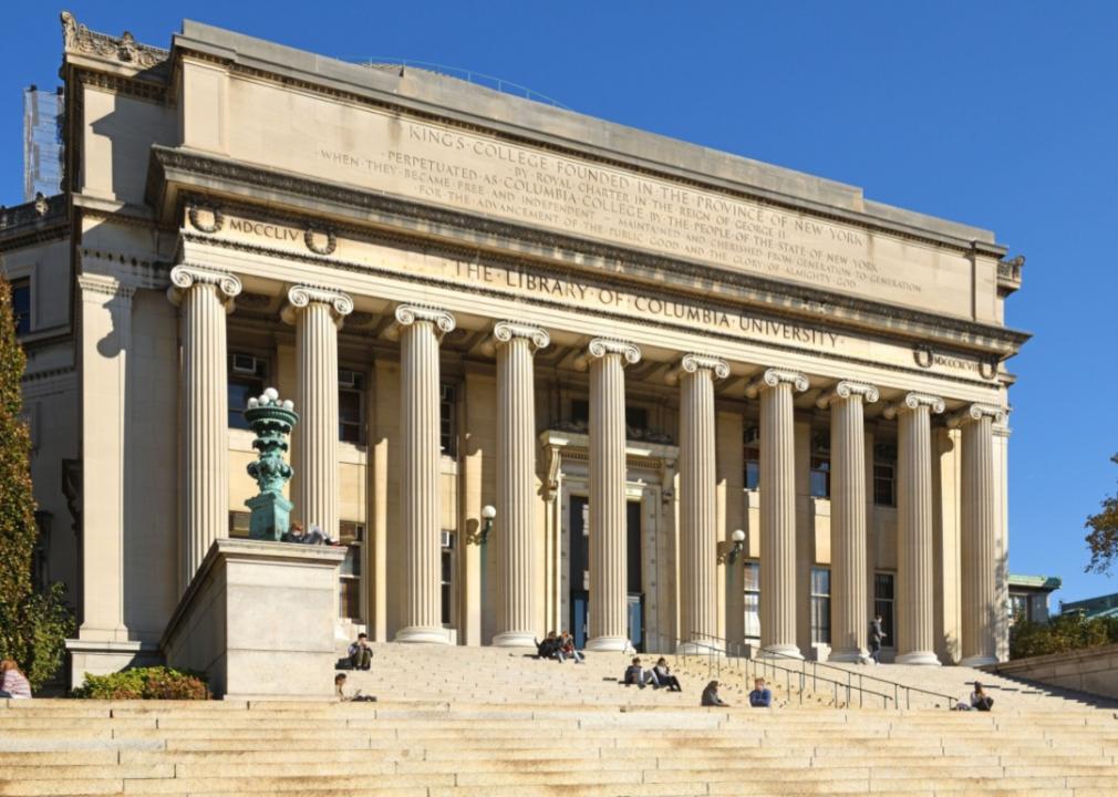 #21. Columbia University in the City of New York Students on the steps at the Columbia University library.