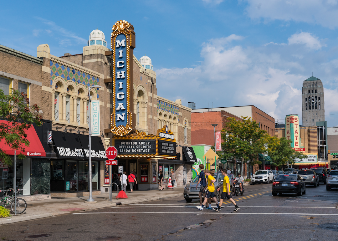 A theater and shops on a main street in Ann Arbor.