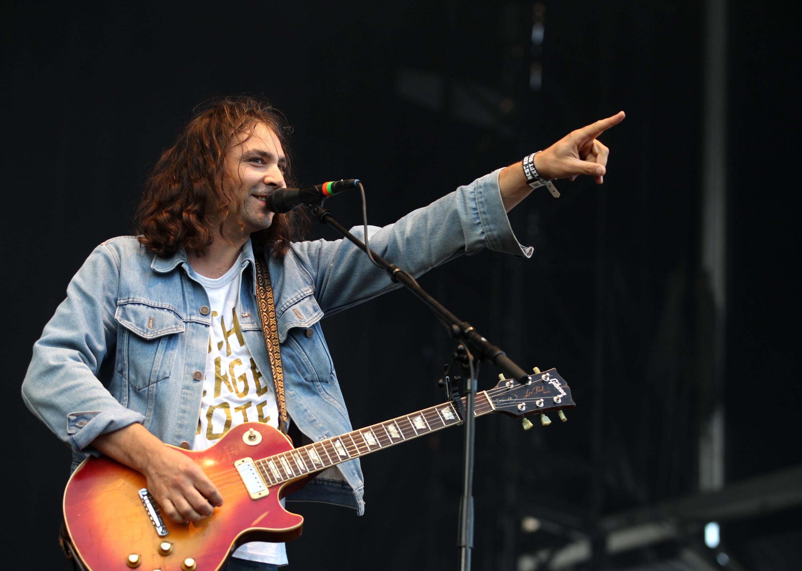 Adam Granduciel of The War on Drugs points the crowd