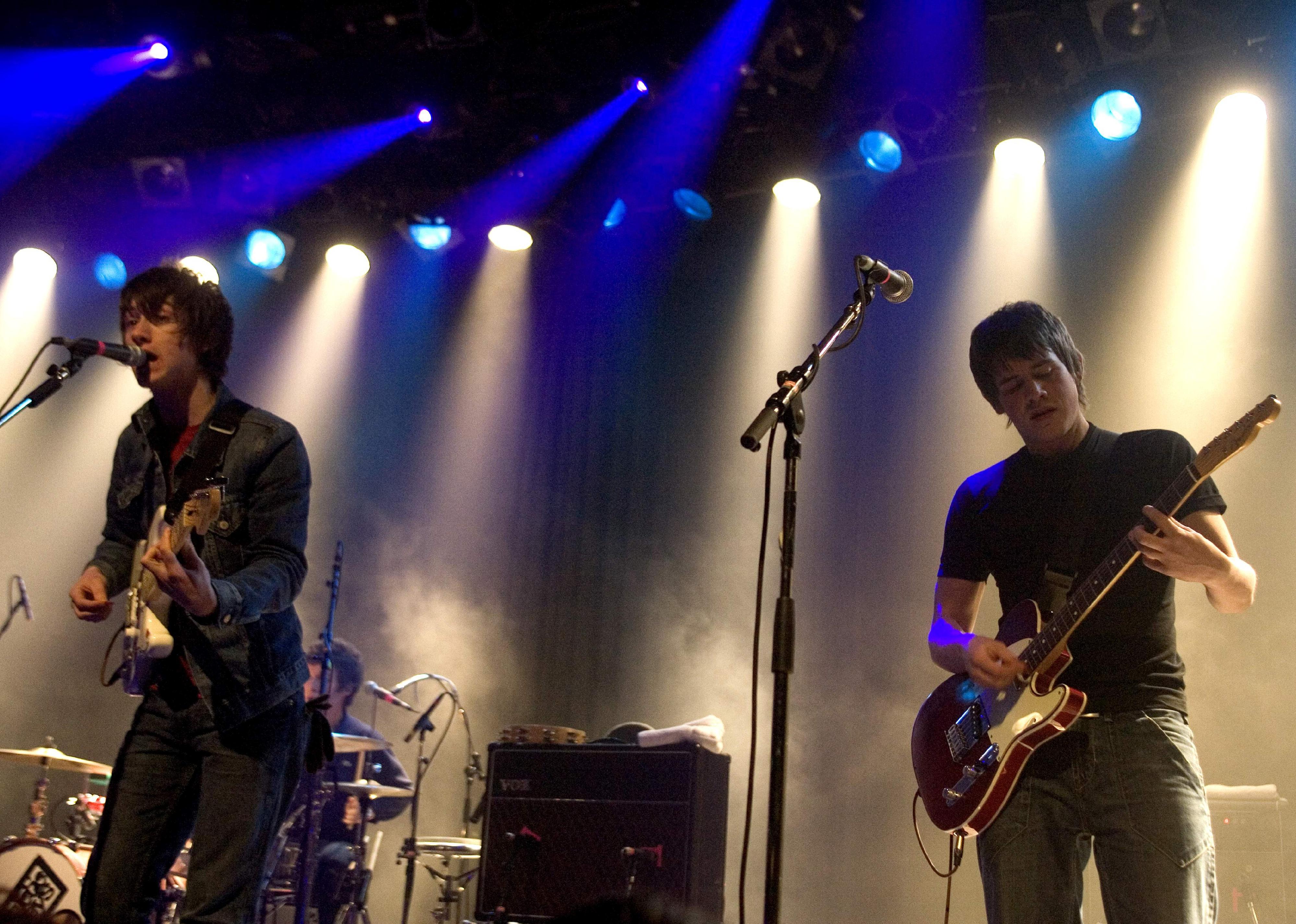 Arctic Monkeys perform onstage