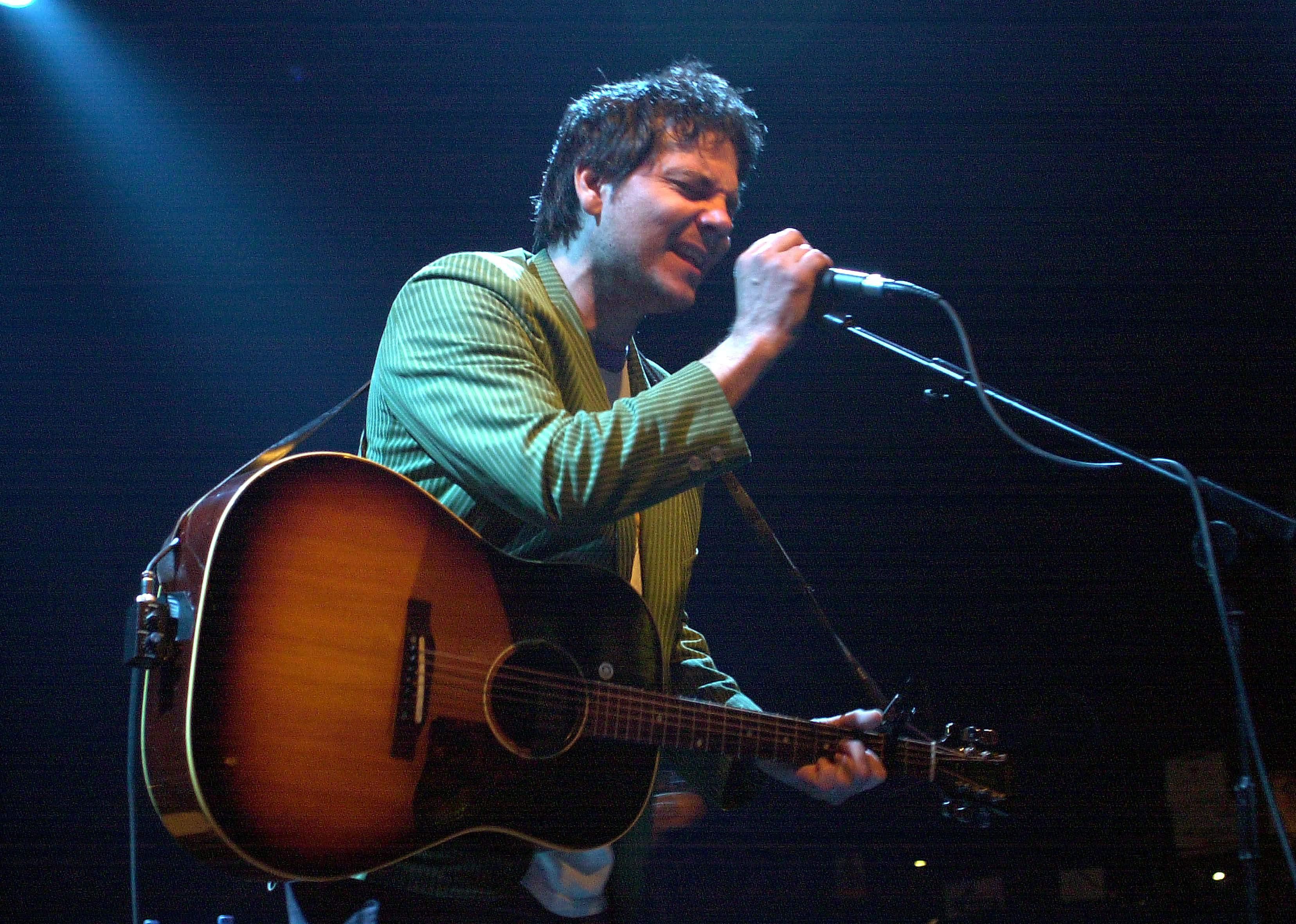 Wilco lead singer Jeff Tweedy sings at a concert