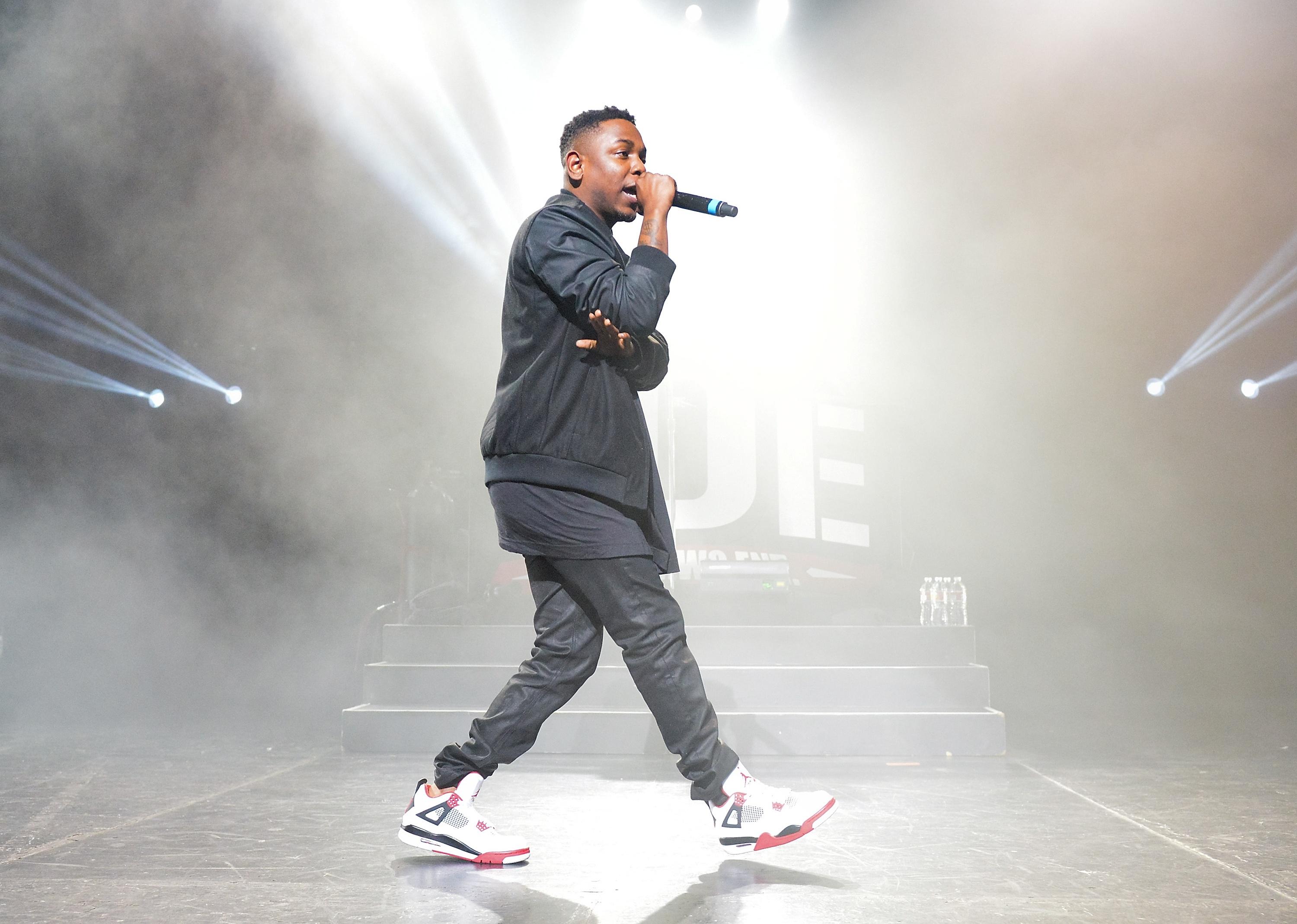 Kendrick Lamar raps onstage