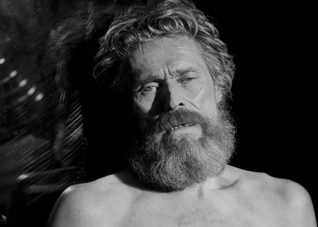 Willem Dafoe shirtless and exhausted.