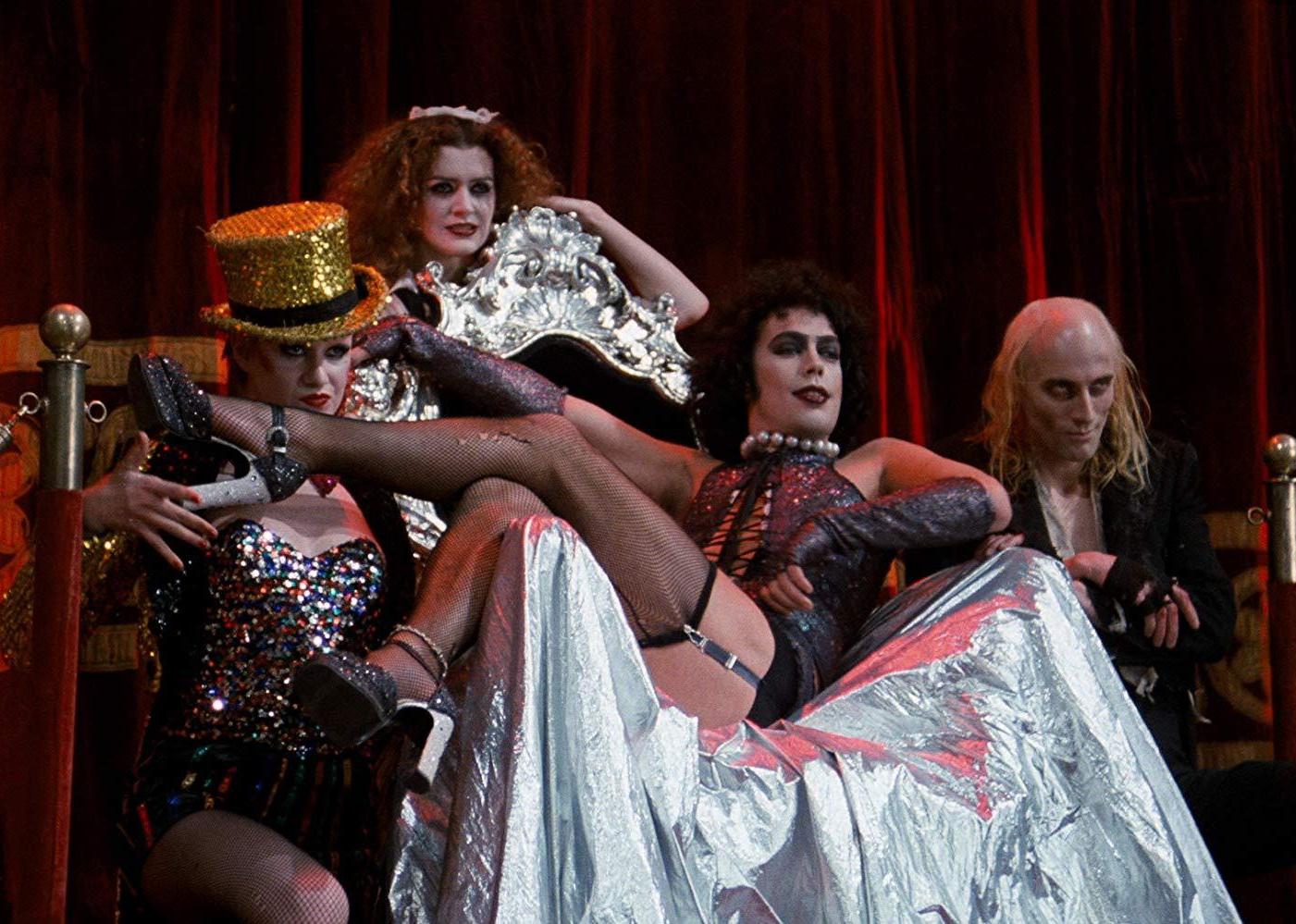A group of cabaret actors posing on a stage.