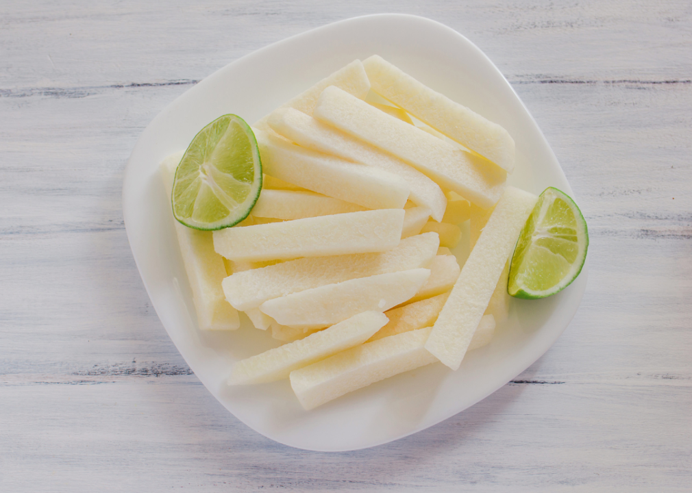 Jicama sticks with lime wedges.