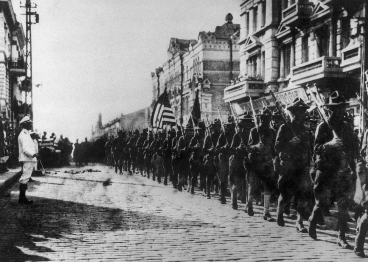 U.S. troops marching.