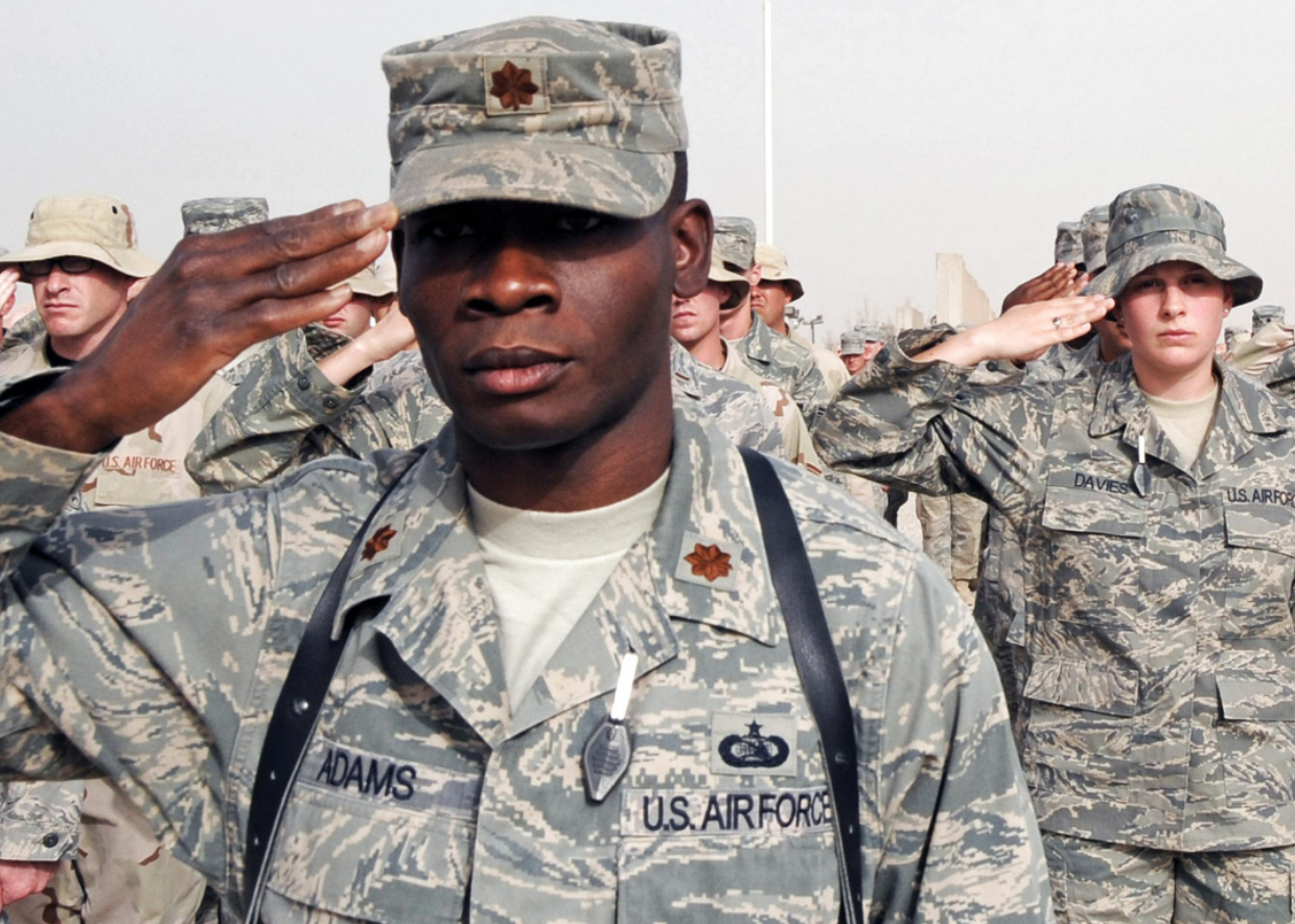 Air Force soldiers saluting.