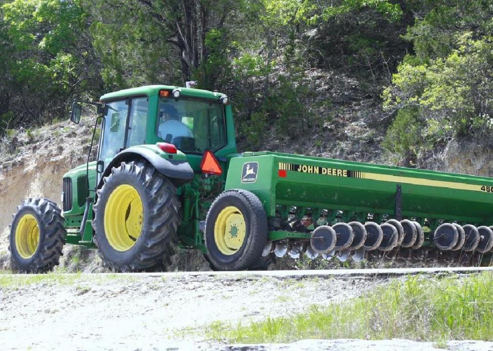 A green John Deere truck.