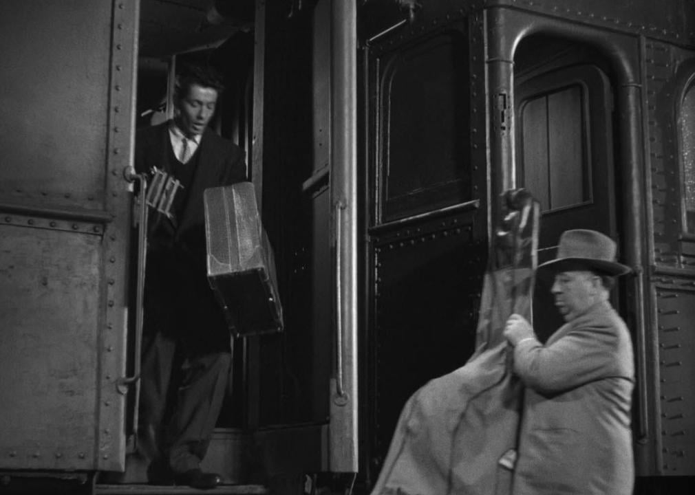 Alfred Hitchcock and Farley Granger in a scene from "Strangers on a Train"