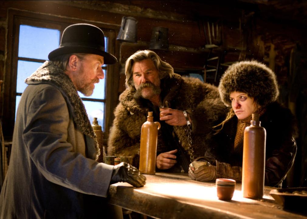 Jennifer Jason Leigh, Tim Roth, and Kurt Russell in a scene from "The Hateful Eight"