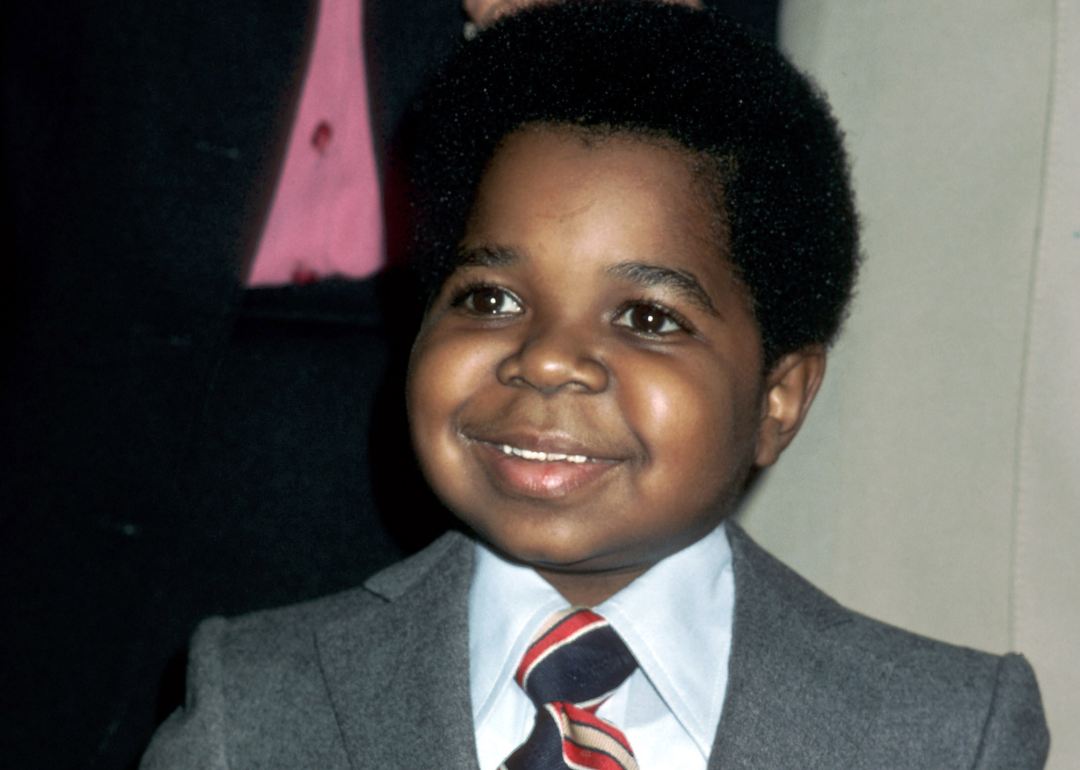 Gary Coleman in a suit and tie.