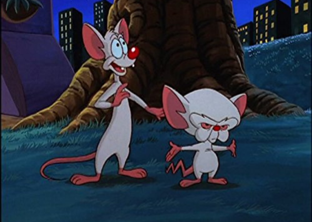 A cartoon of two mice by a tree.