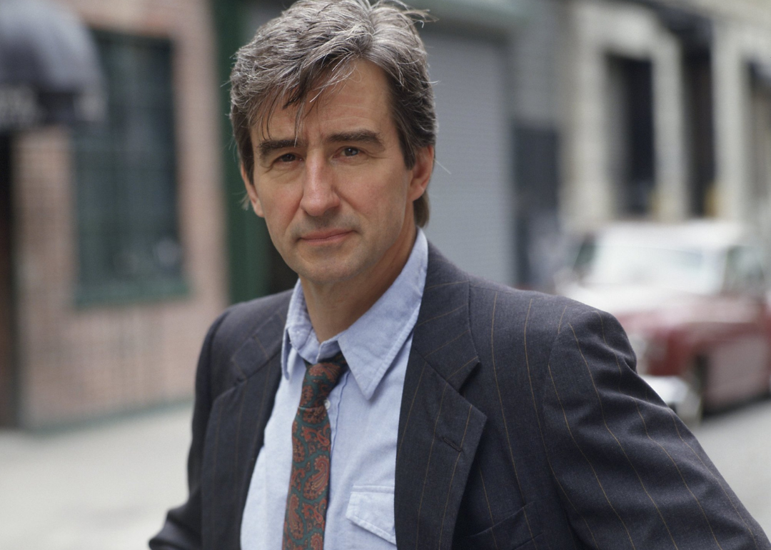 Sam Waterston in a gray suit.