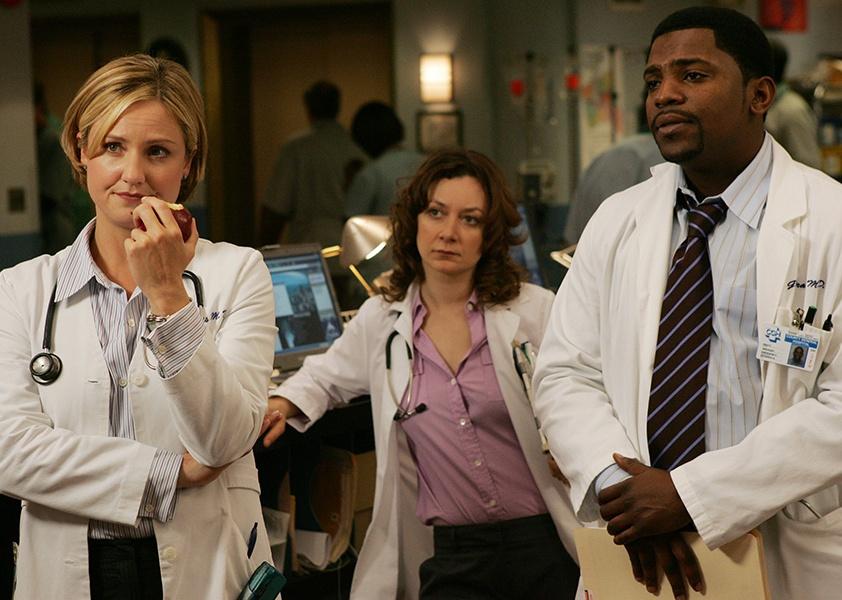 Mekhi Phifer, Sara Gilbert, and Sherry Stringfield in white doctor coats.