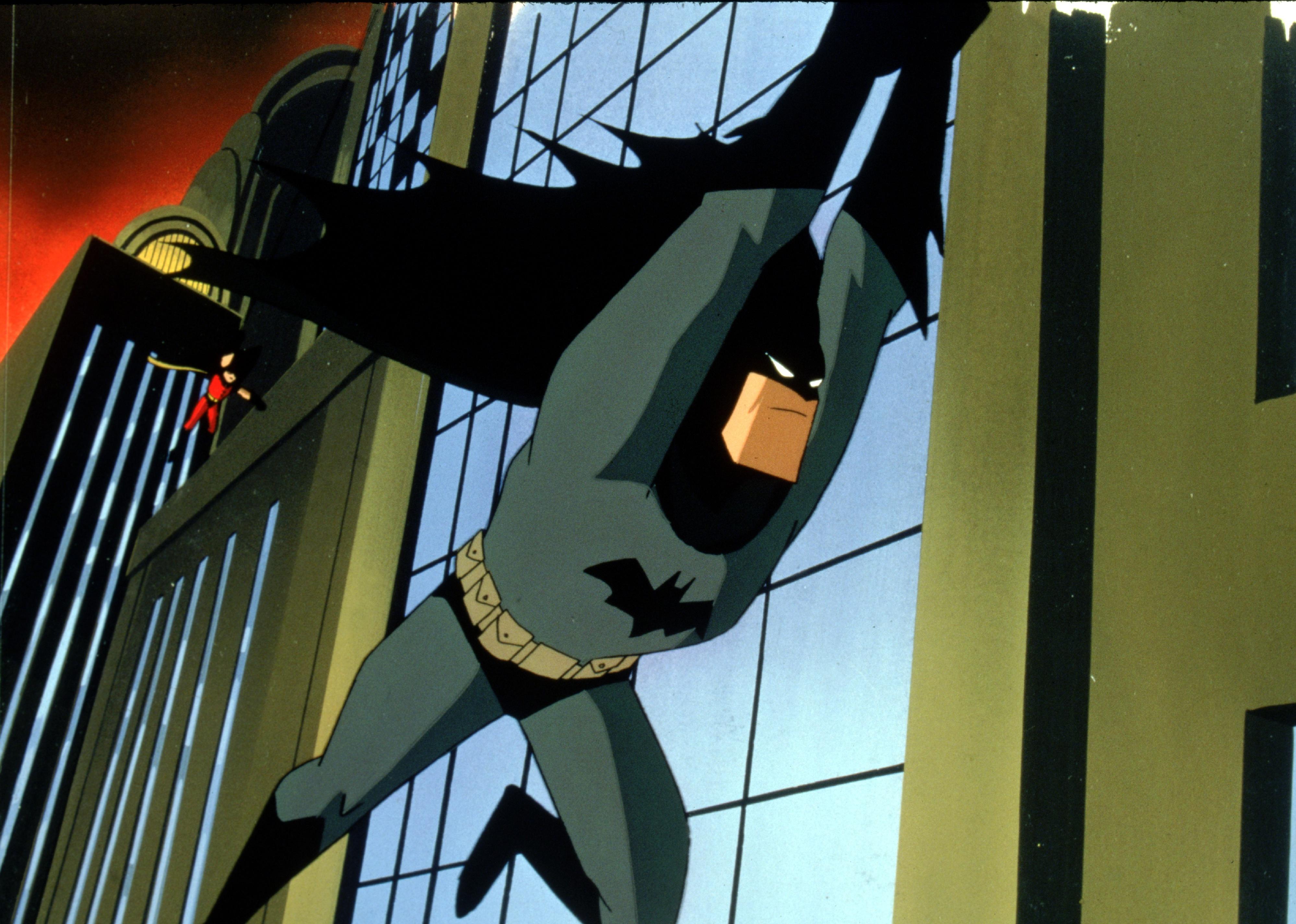 An animation of Batman and Robin flying though downtown.