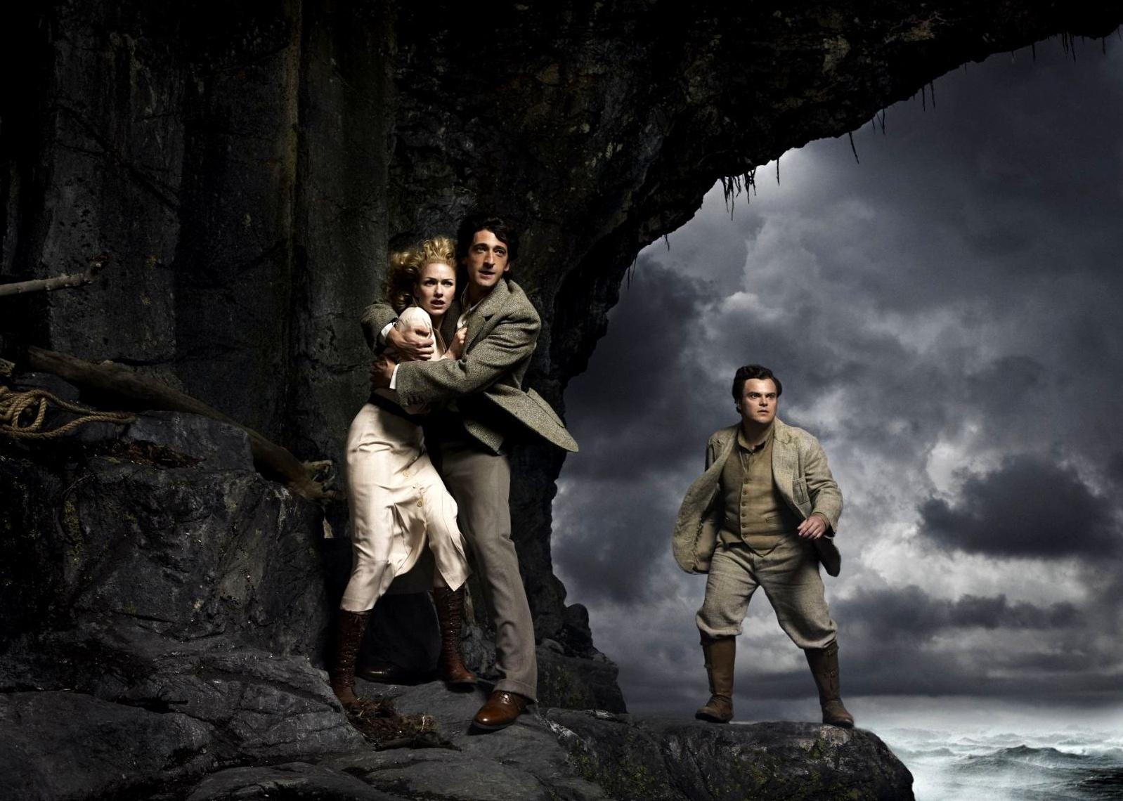 Naomi Watts Jack Black and Adrien Brody in a cave hiding from King Kong.
