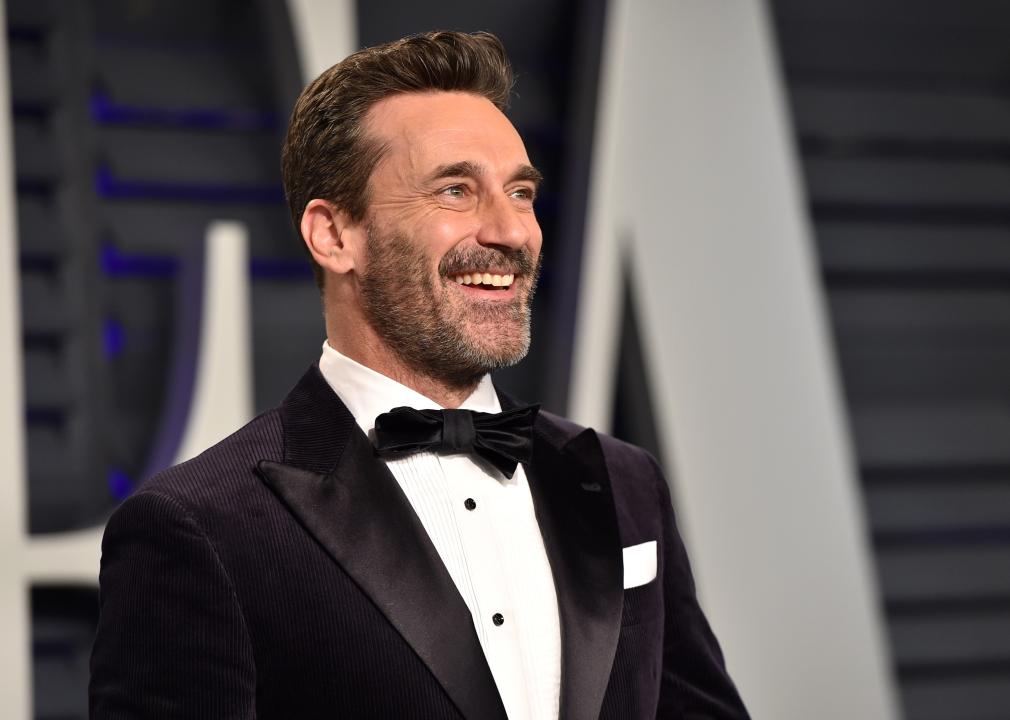 Jon Hamm smiles at an Oscar party.