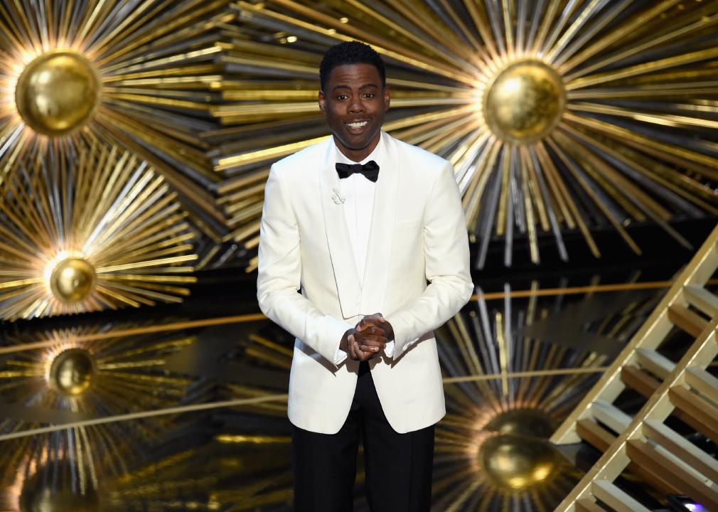 Chris Rock speaks onstage at the Academy Awards in 2016.