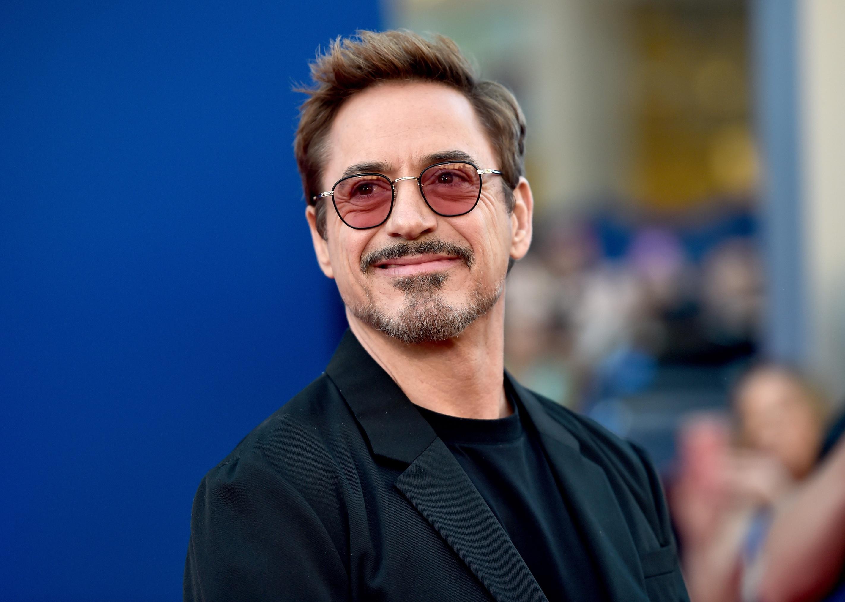 Robert Downey Jr. in a black suit.