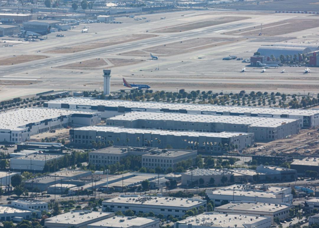 An aerial view of buildings planes on the runway at Bob Hope Airport.