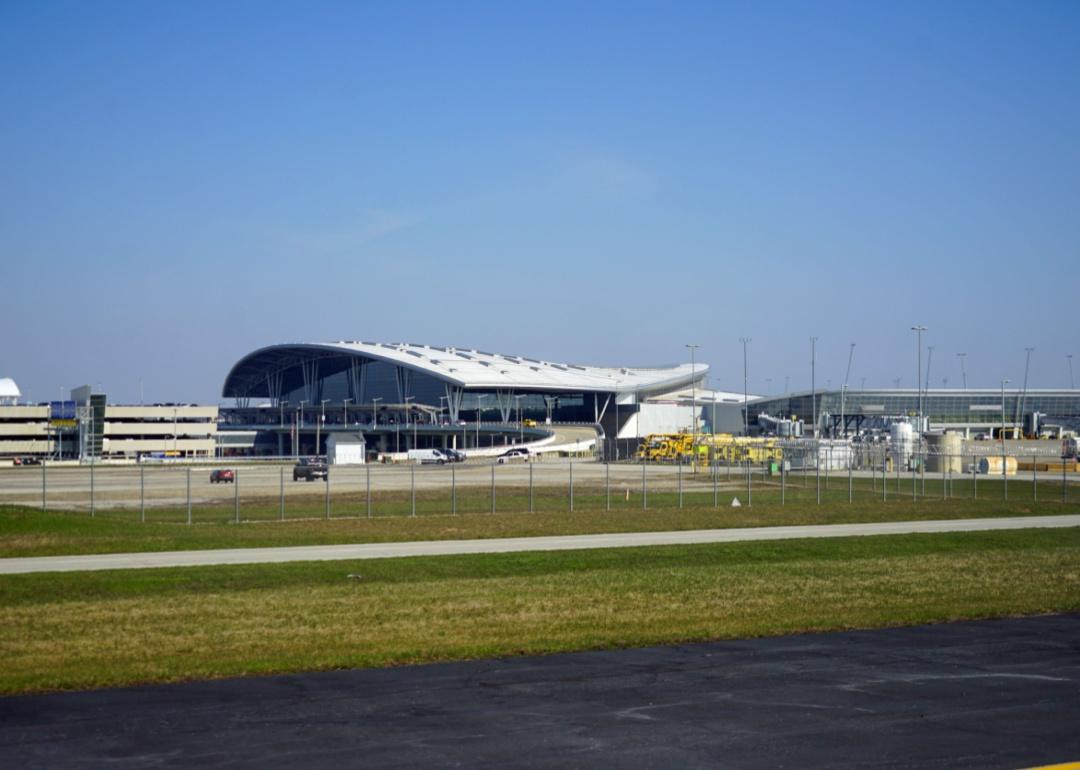 An exterior view of the terminal and a curved building at Indianapolis airport.