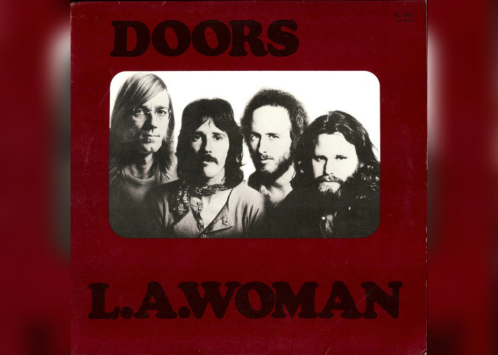 Black and white image of The Doors with maroon frame.