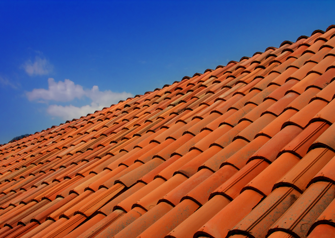 A red tile roof on a home.