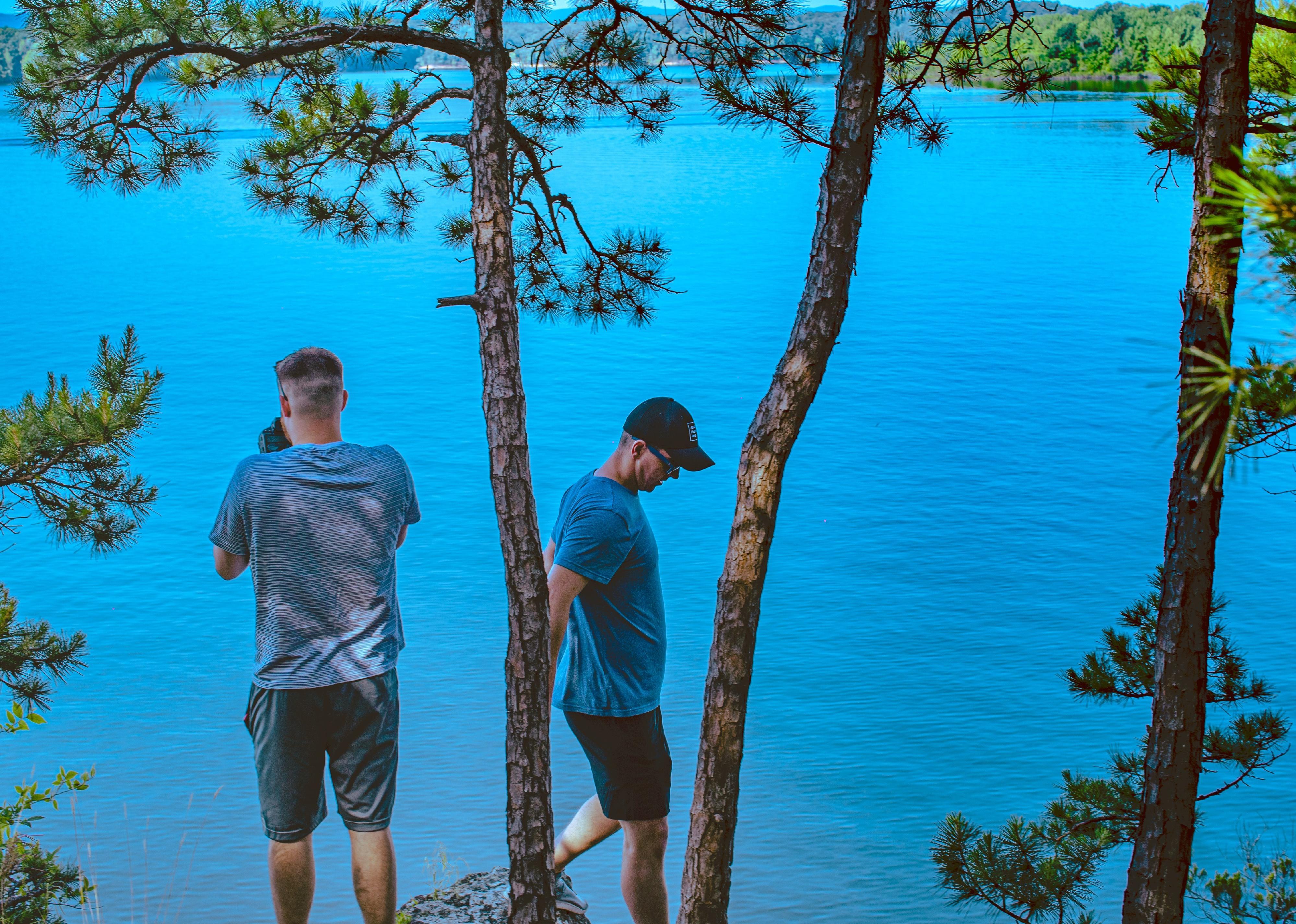 Two men get a bird's-eye view of a lake.