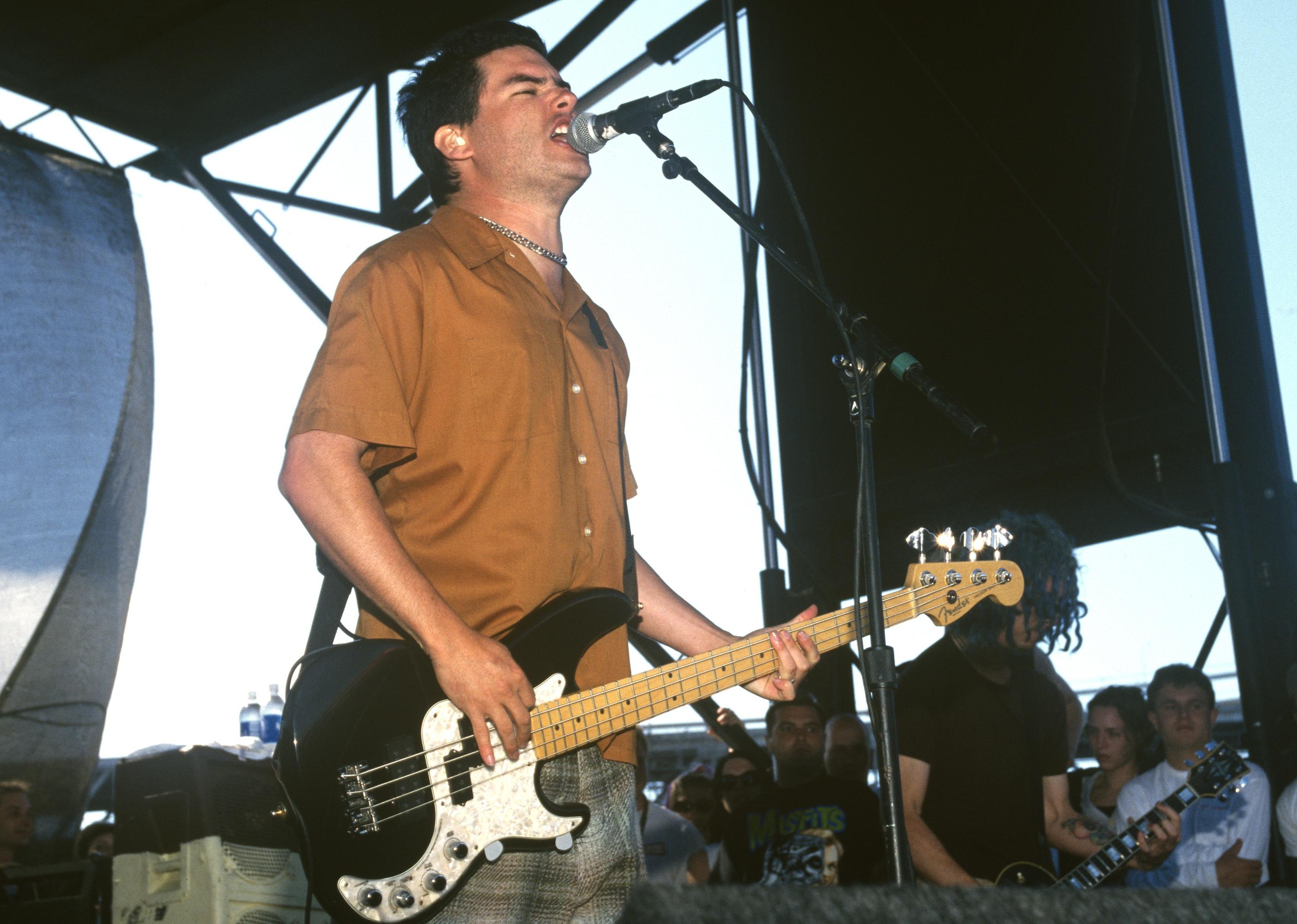 NOFX performing onstage.