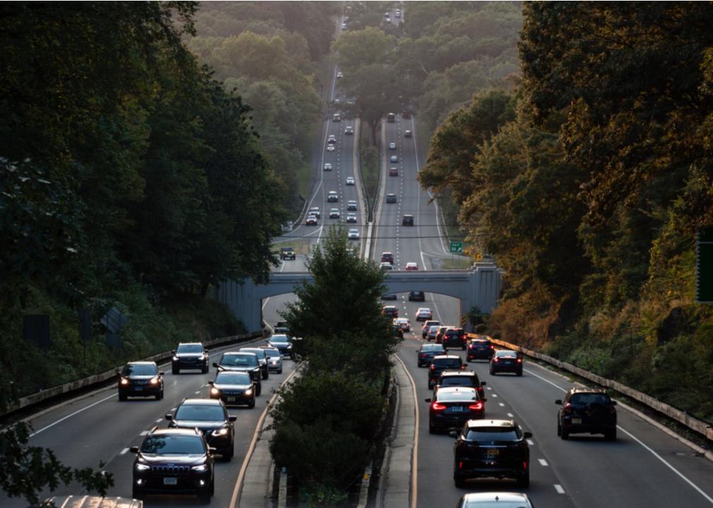 Traffic at dusk on the Merritt Parkway in New Canaan, Connecticut.